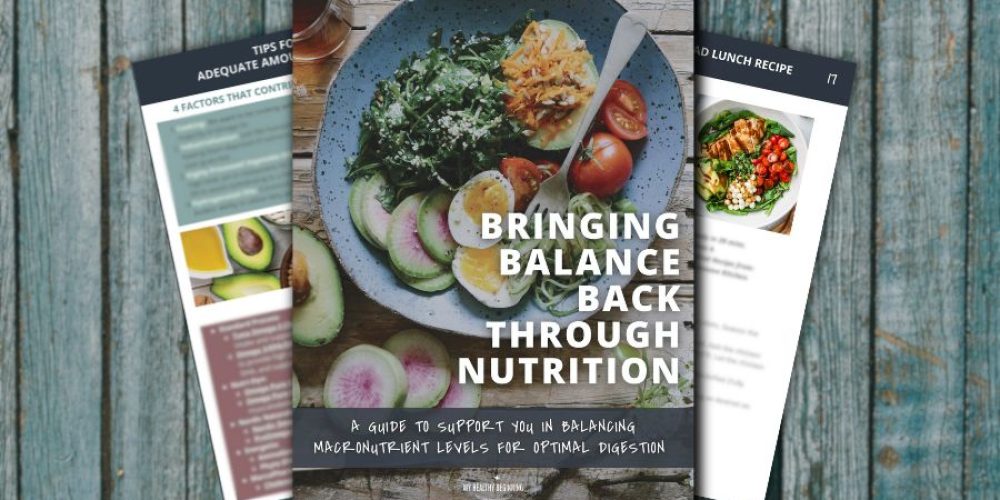Pages from Macronutrients Guide with wood background
